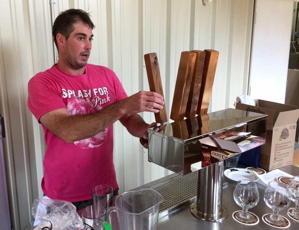 Nate Herrold pours a sample