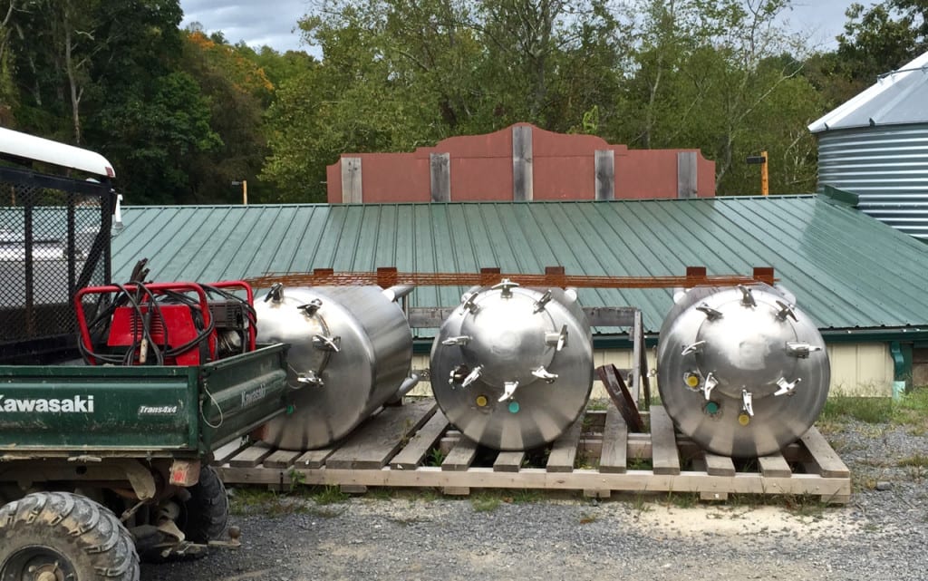 Several stainless steel bright tanks at Heston Farm