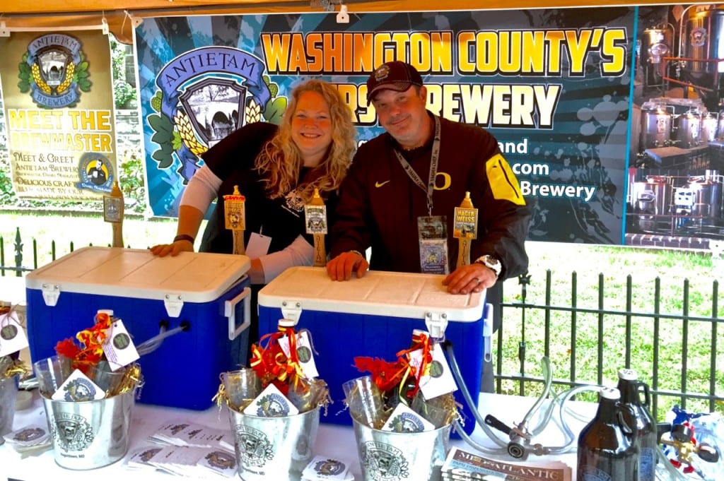 Dan and Chelsea Maerzluft, representing Hagerstown, Maryland's Antietam Brewery, prepare to meet the crowd the 2015 Bramwell Oktoberfest.