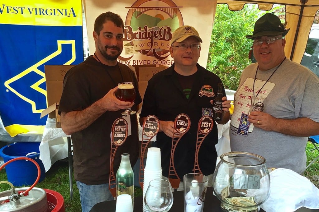 Bridge Brew Works co-owners/brewers Nate Herrold (left), Ken Linch (center) racked up a bounty of medals at the 2015 Bramwell Oktoberfest.