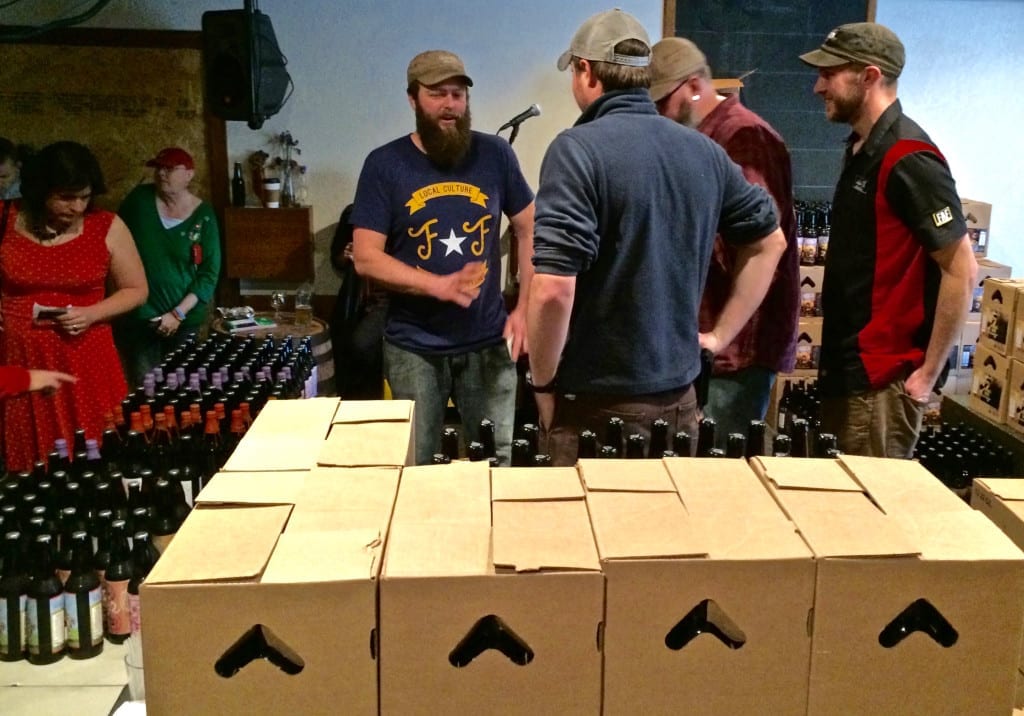 Jackie O's staff prepare for the annual Anniversary Bottle Sale
