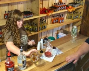 Small free samples are poured in the distillery tasting rooms.